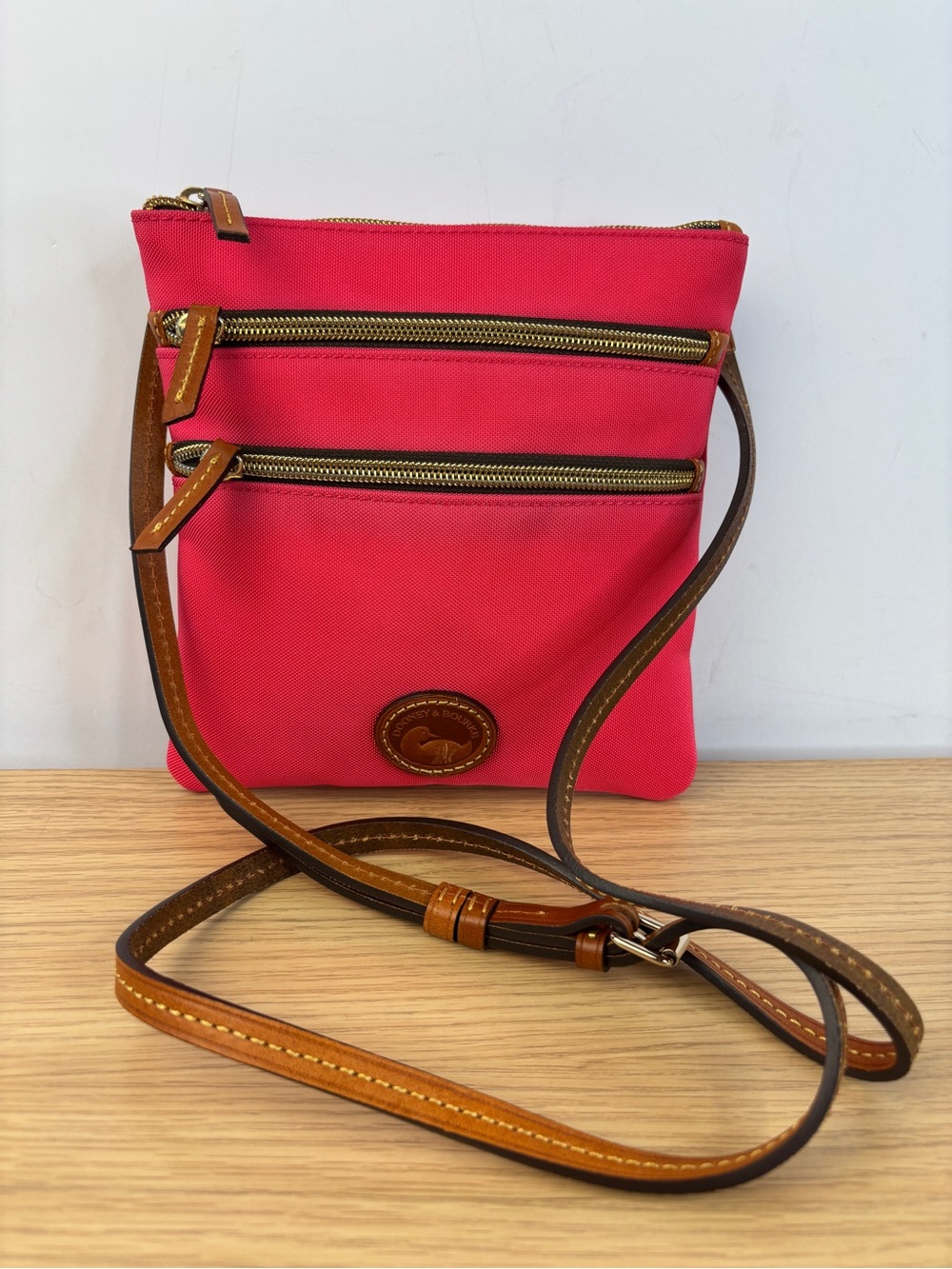 Dooney & Bourke Nylon North South Triple Zip Hot Pink Crossbody
